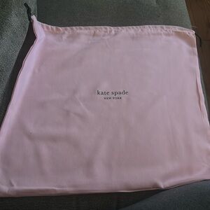 Kate spade drawstring dust bag NWOT it’s big size 19x171/2 Clean